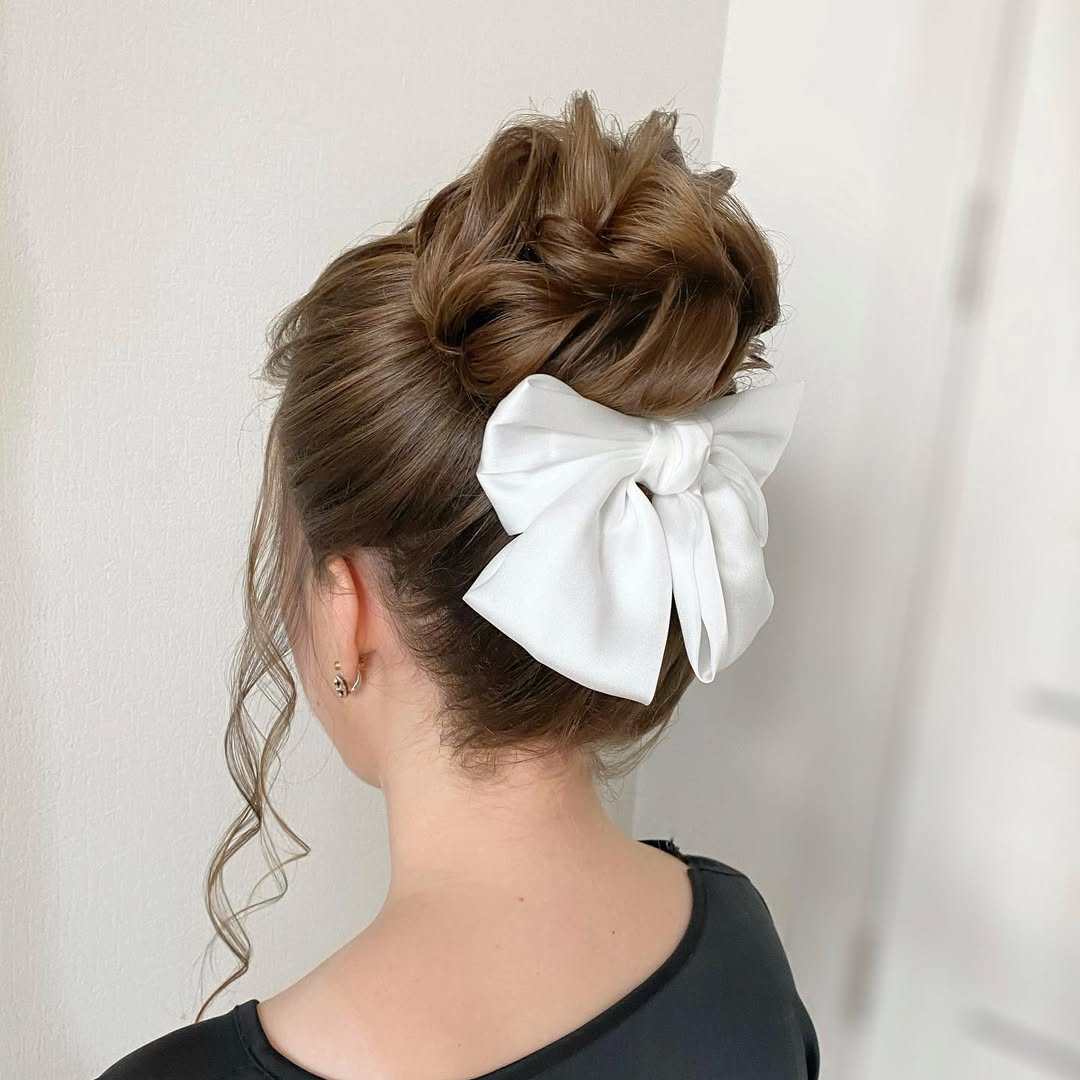 Chic Bow Updo With Soft Curls