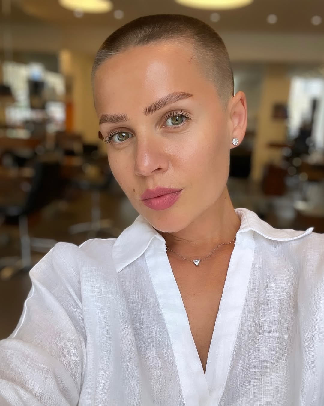 Chic Buzz Cut With Natural Brow Elevation