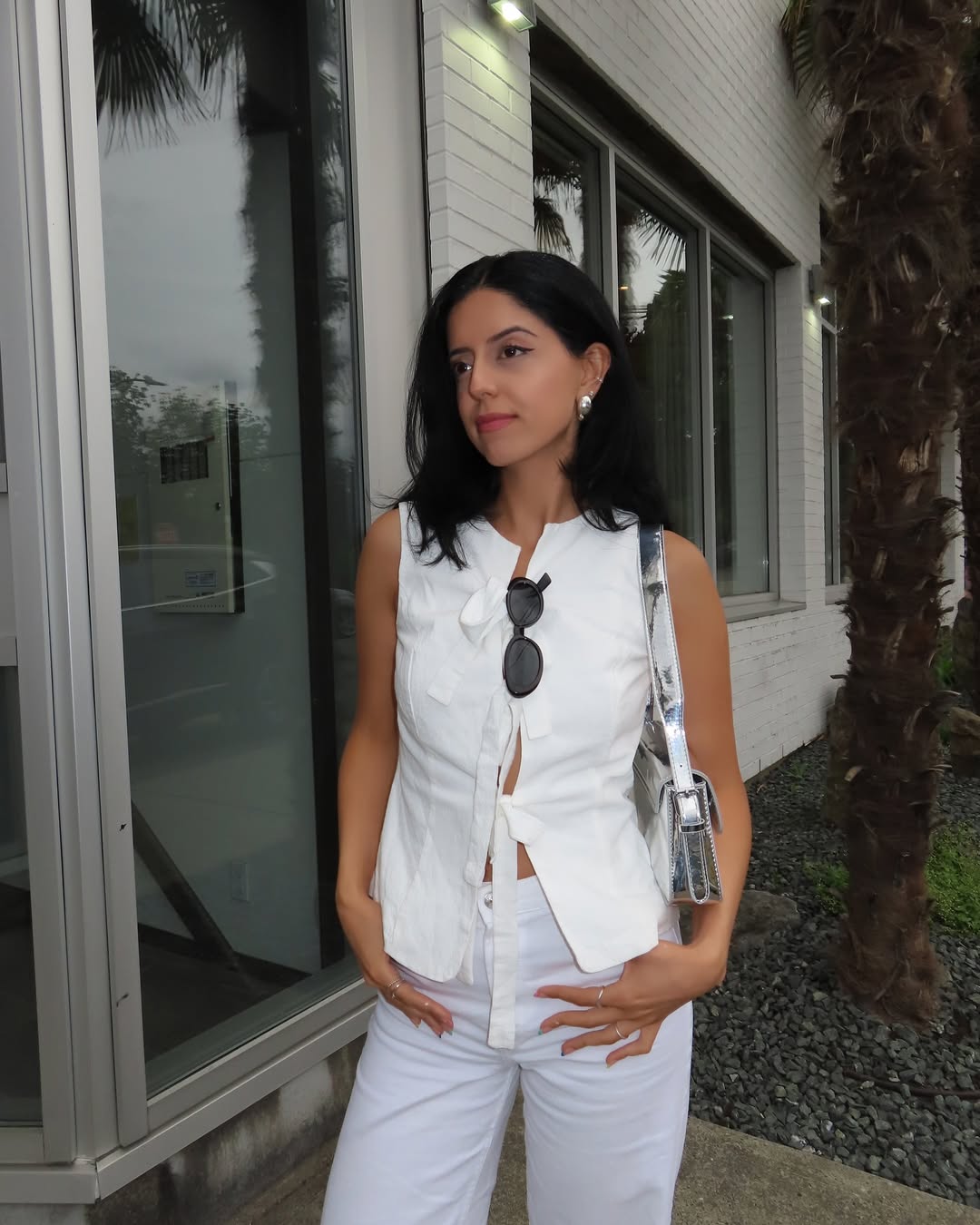Chic White Sleeveless Top and White Trousers Outfit