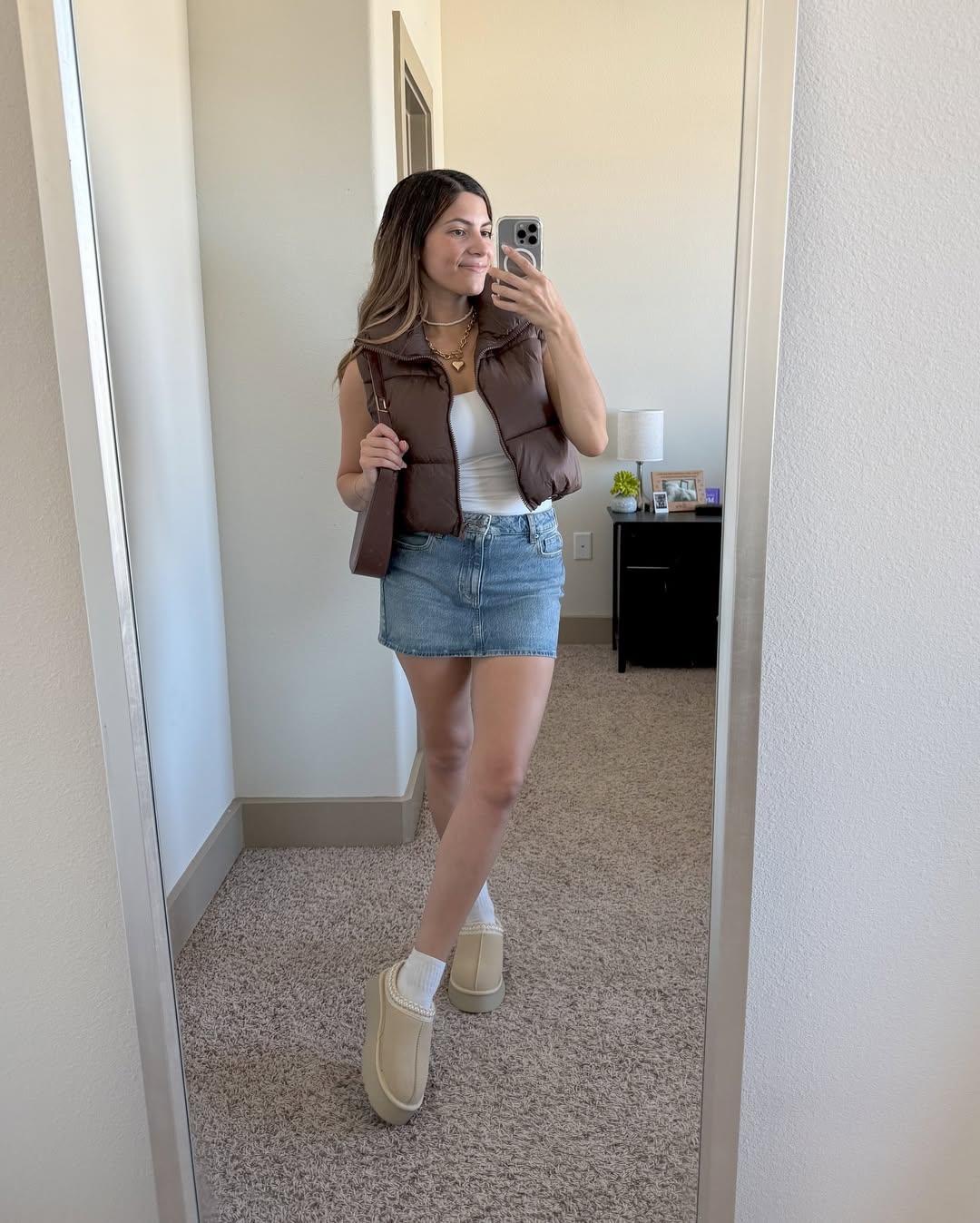 Chocolate Puffer Vest With Denim Mini Skirt Outfit