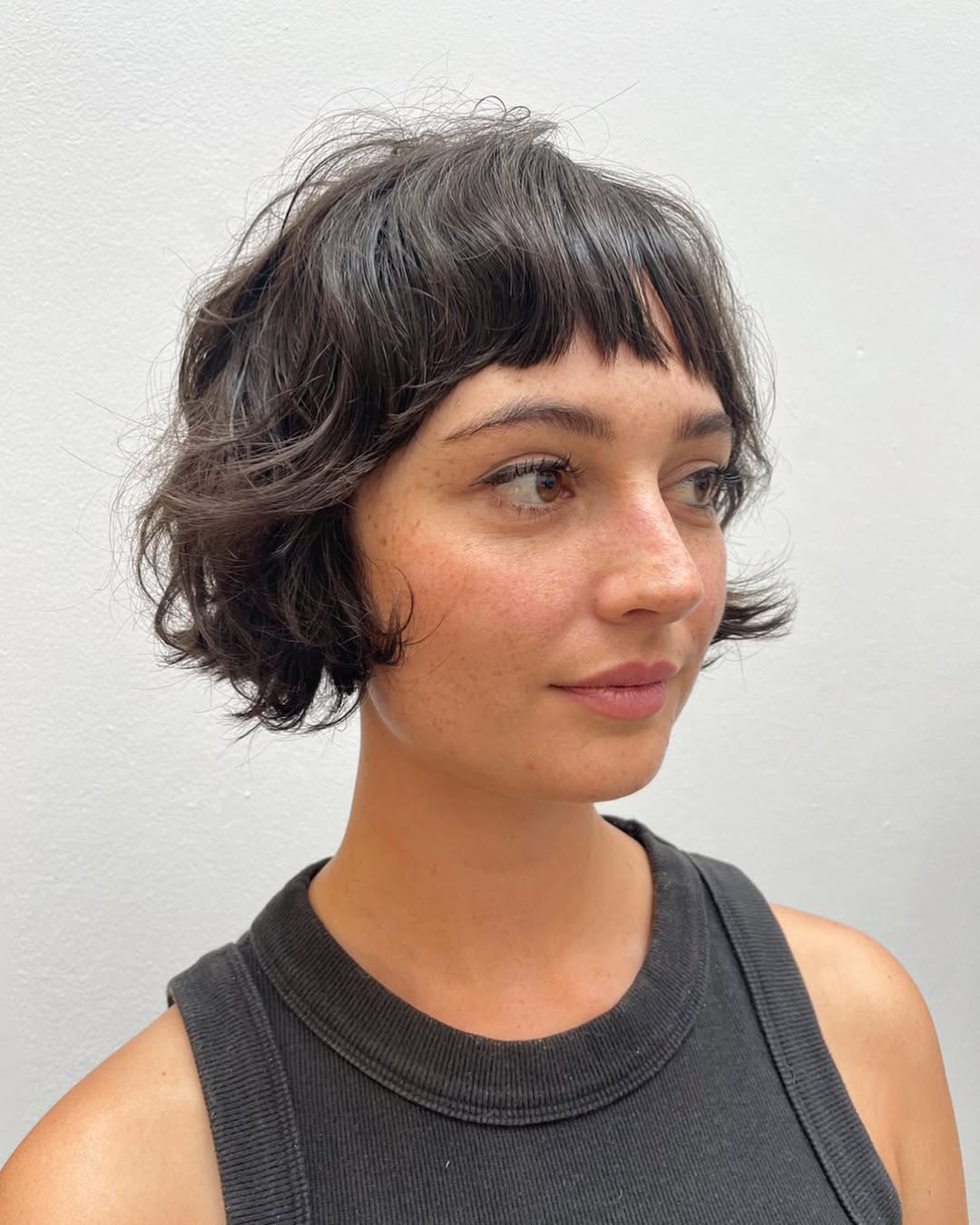 Choppy Chin-Length Shag With Wispy Bangs