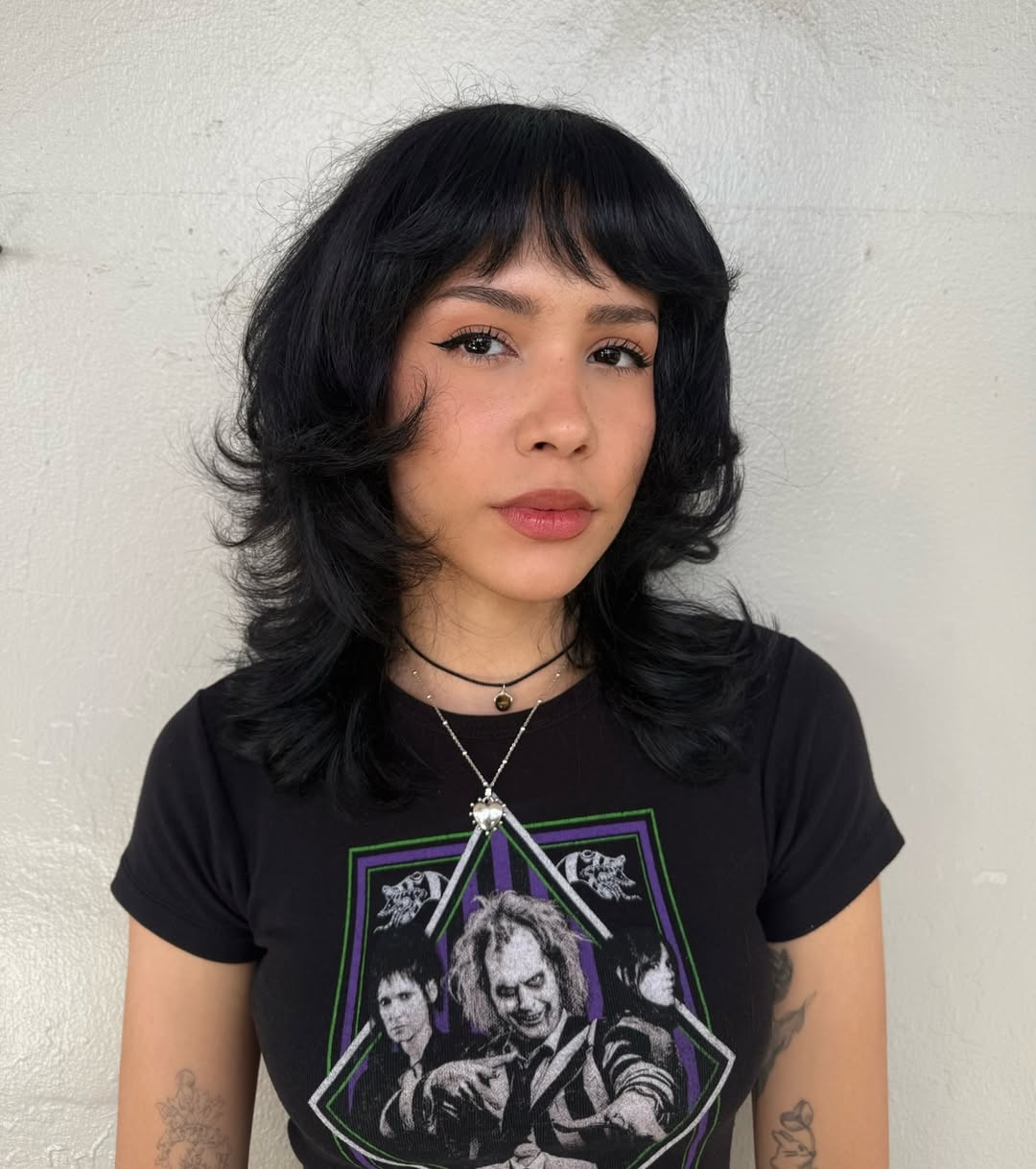 Choppy Jet Black Shag With Full Bangs