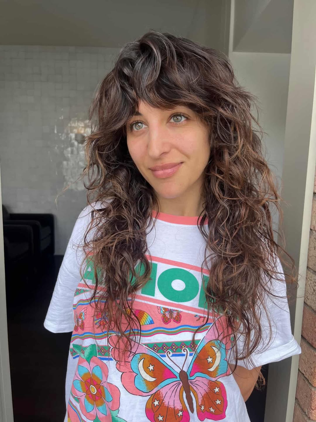 Choppy Layered Shag With Curly Fringe