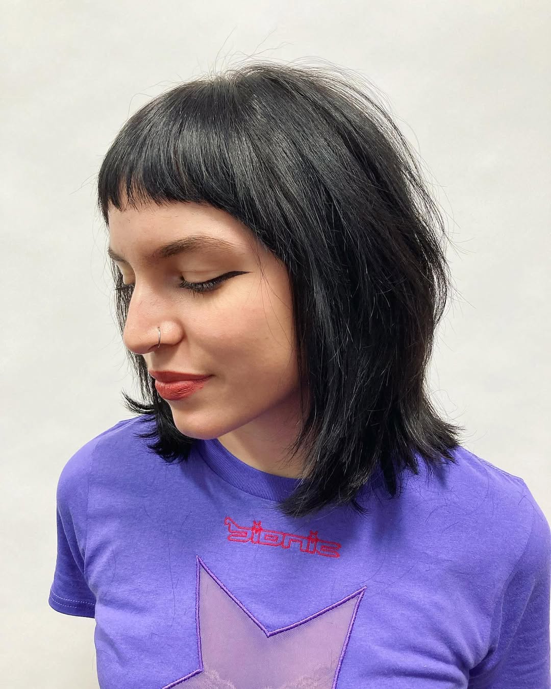 Choppy Micro Bangs With Layered Black Bob