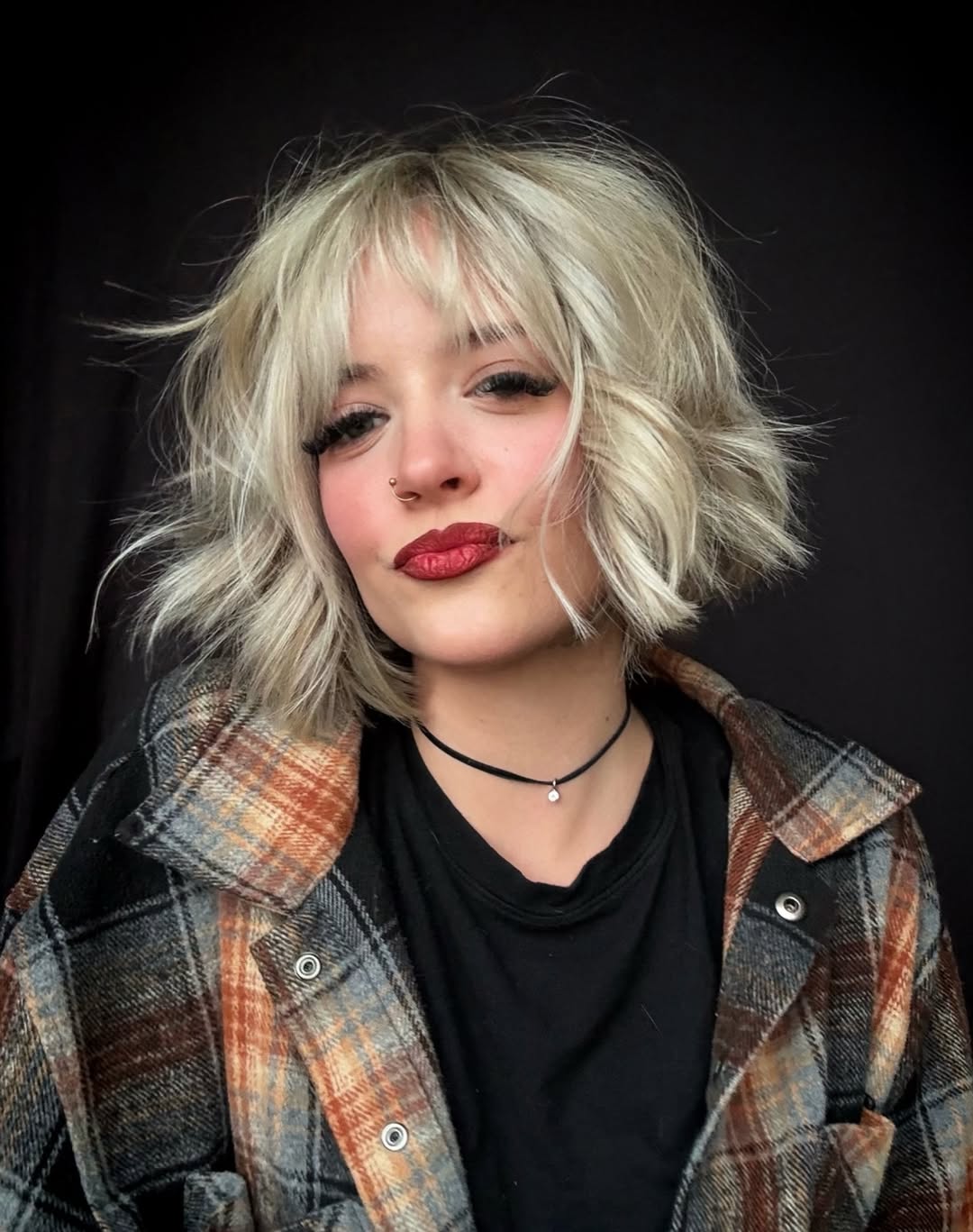 Choppy Platinum Bob With Wispy Bangs