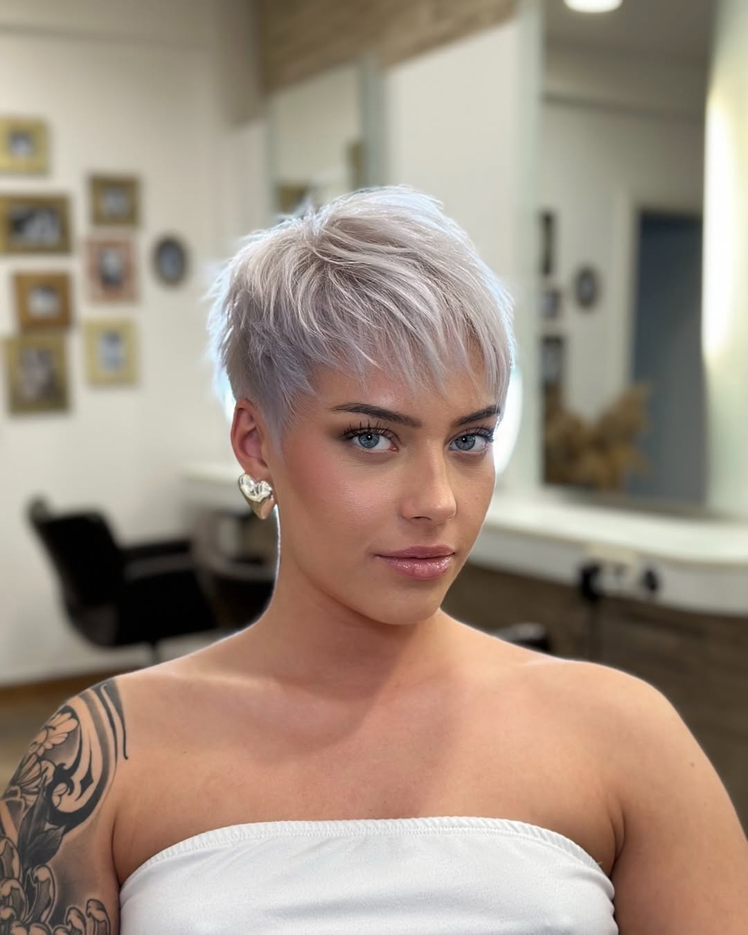 Choppy Platinum Pixie With Subtle Side Bang