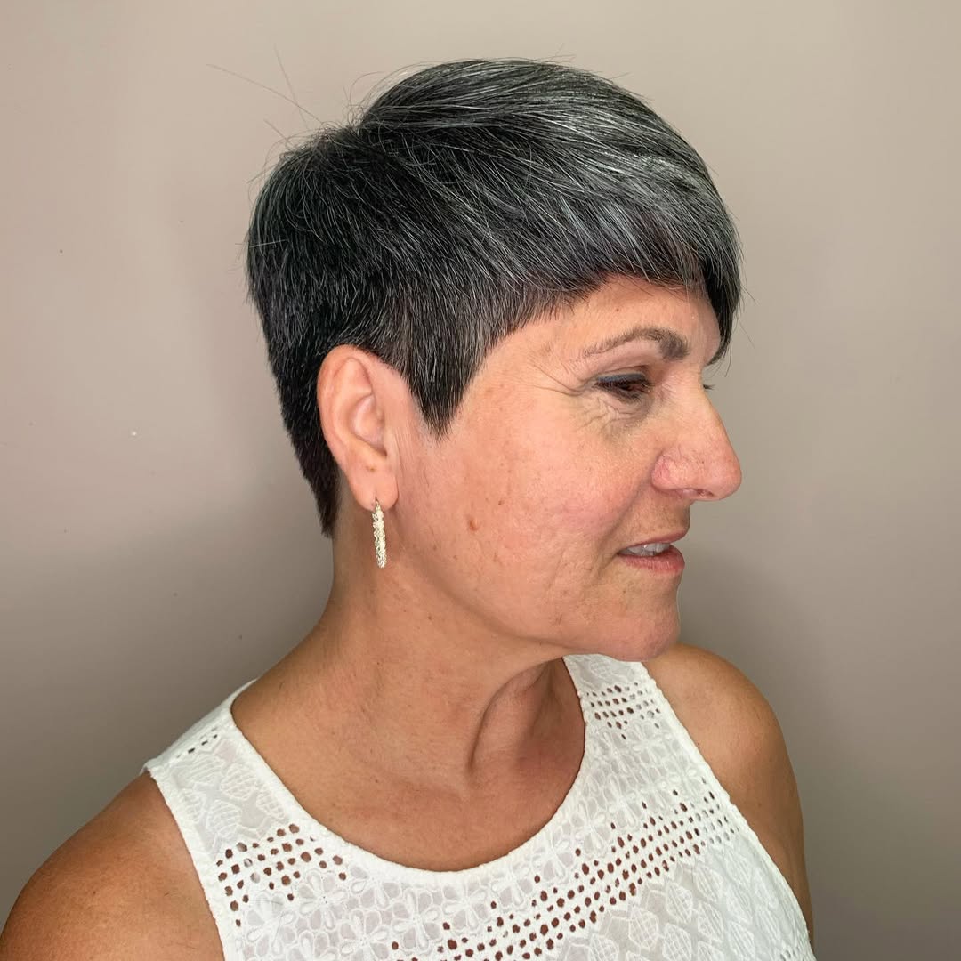 Choppy Salt And Pepper Pixie with Asymmetrical Bangs
