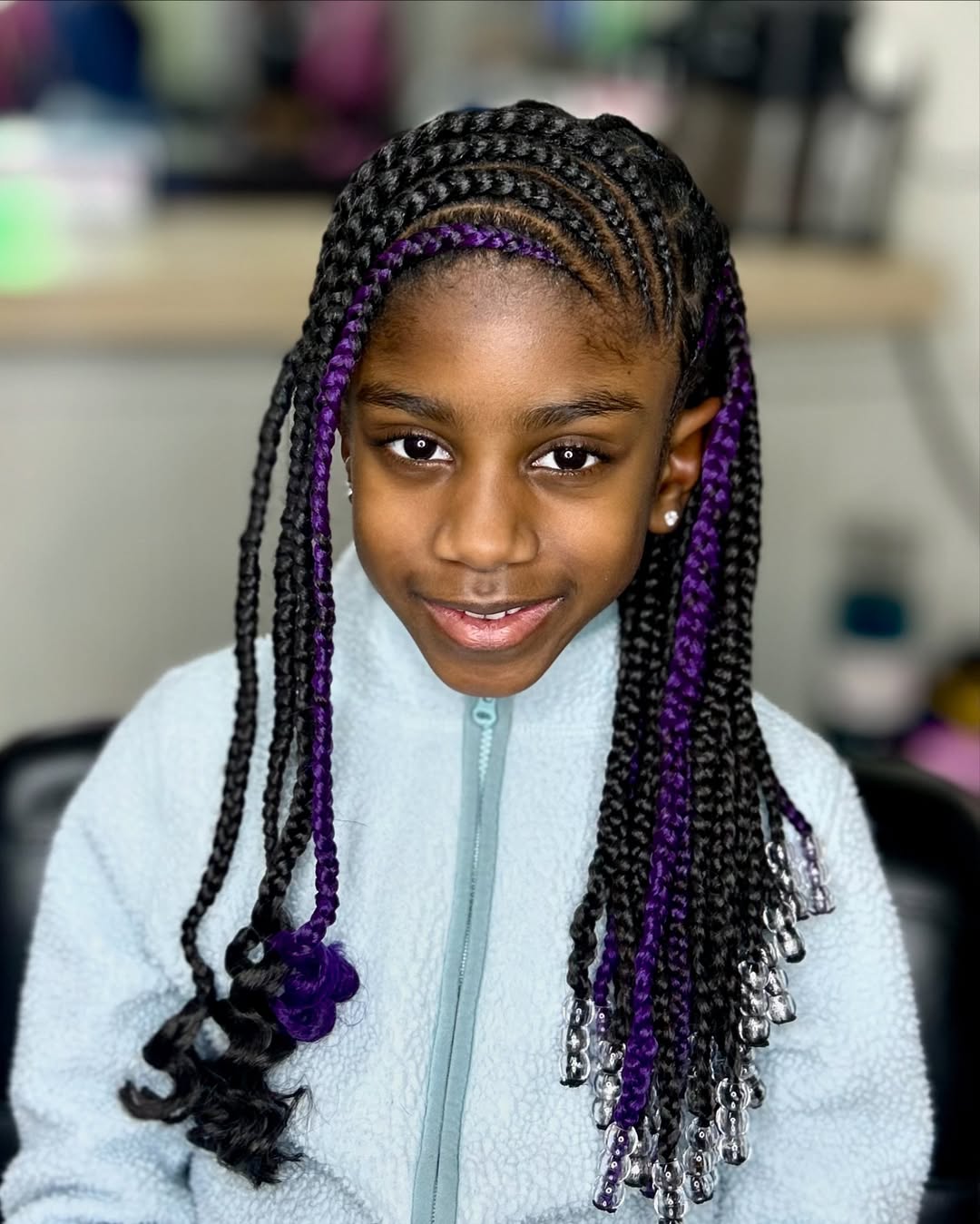 Classic Cornrows with Vibrant Purple and Beaded Ends