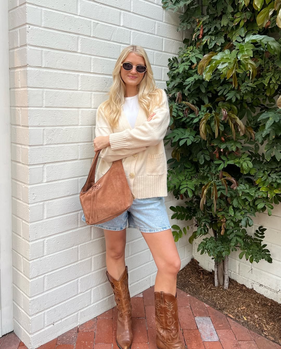 Cozy Cream Cardigan With Denim Cutoffs and Boots