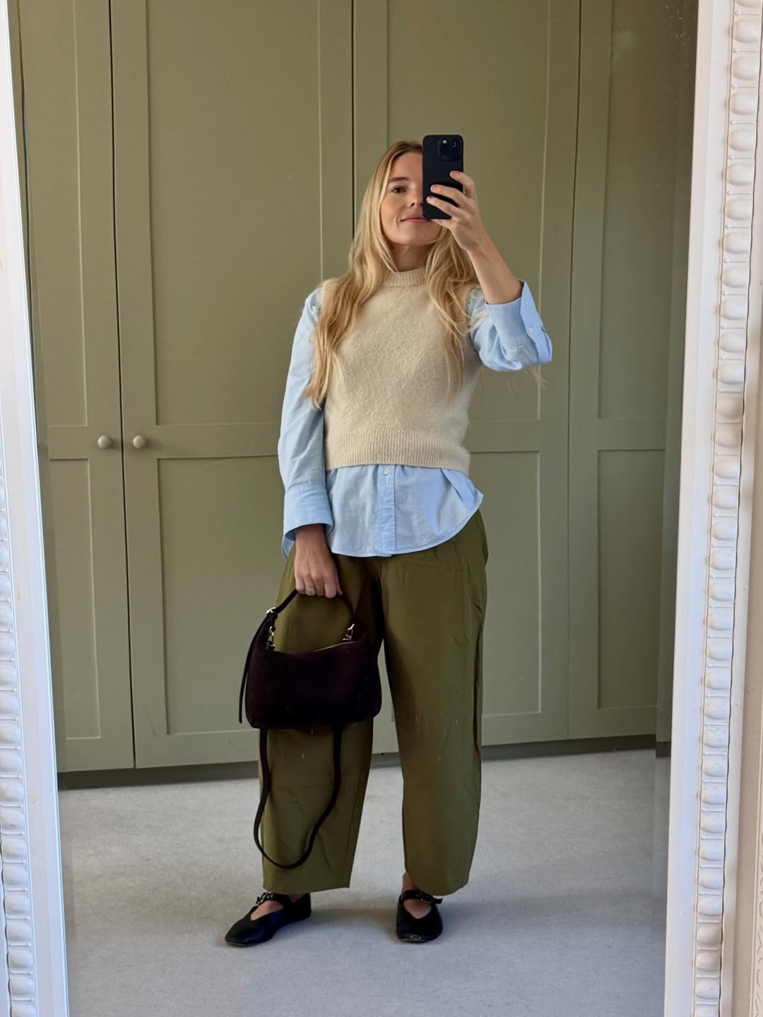 Cozy Knit Vest Over Blue Button-Down & Olive Trousers
