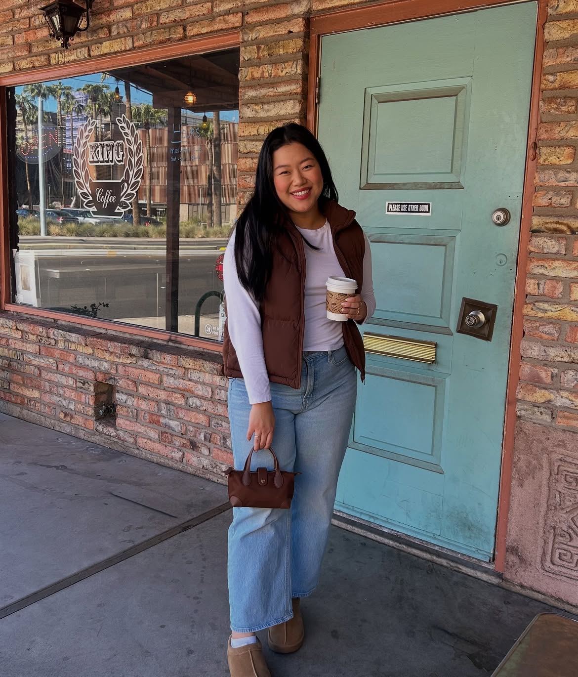 Cozy Puffer Vest With Wide Leg Jeans and Uggs