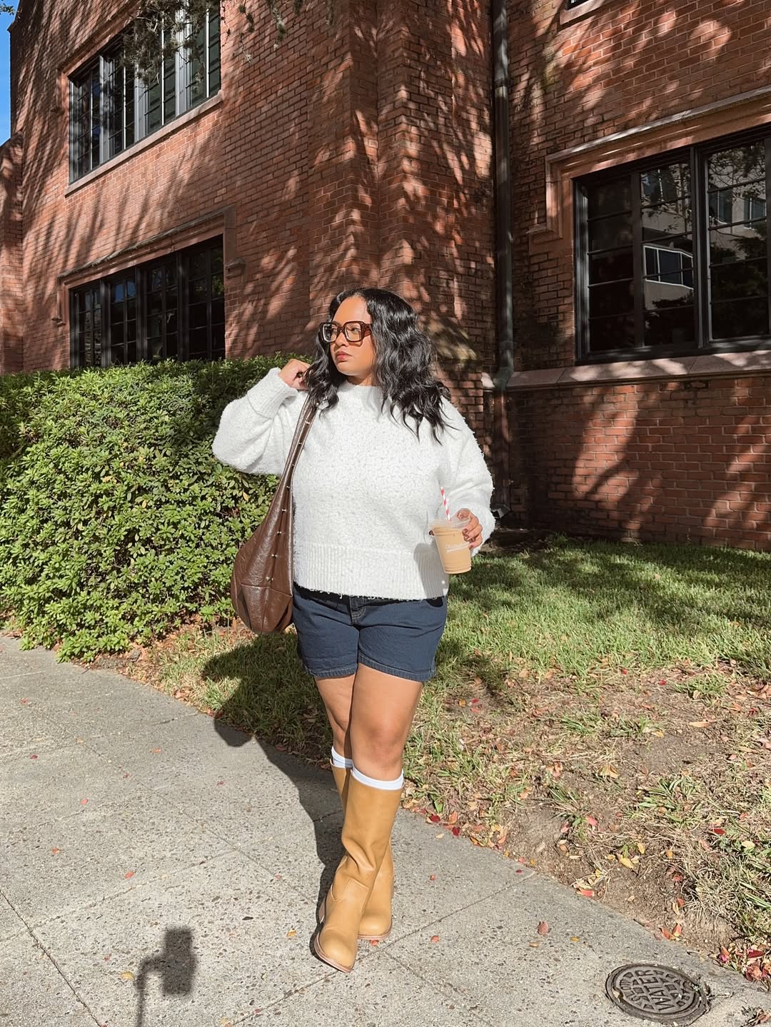 Cozy Sweater With Denim Shorts And Tall Boots