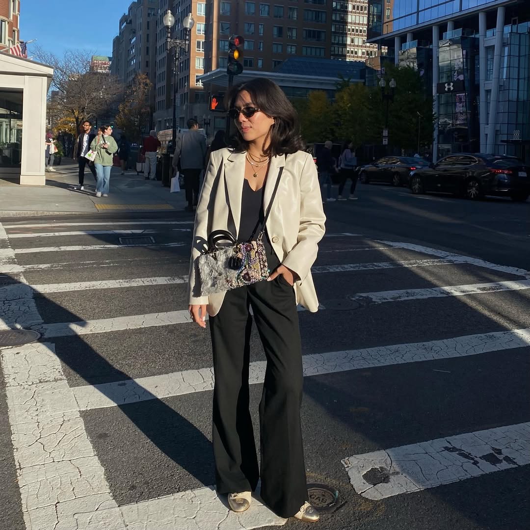 Cream Blazer With Black Wide Leg Pants And Statement Bag
