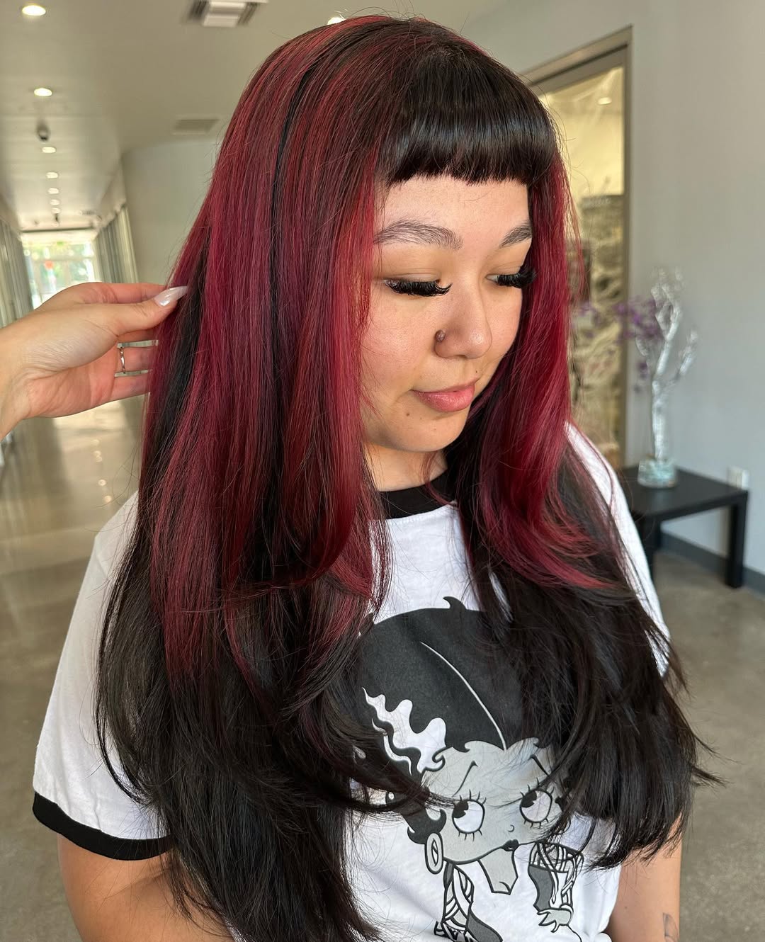 Crimson And Black Layered Hair With Blunt Micro Bangs