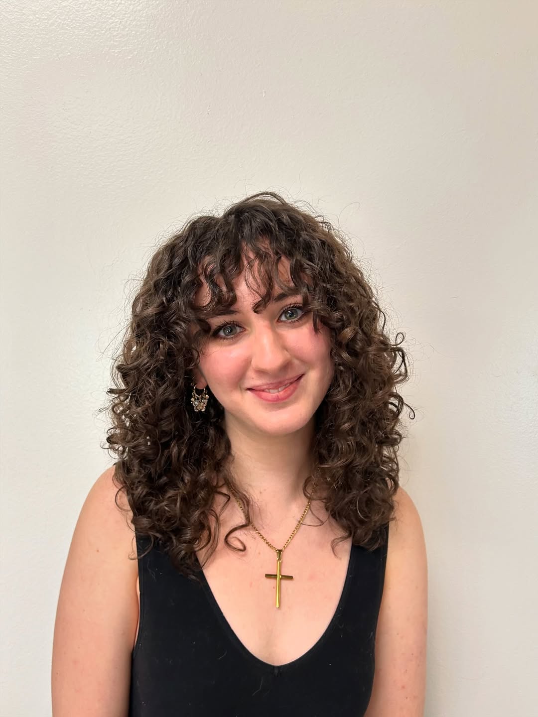 Curly Shag With Wispy Bangs And Natural Brown