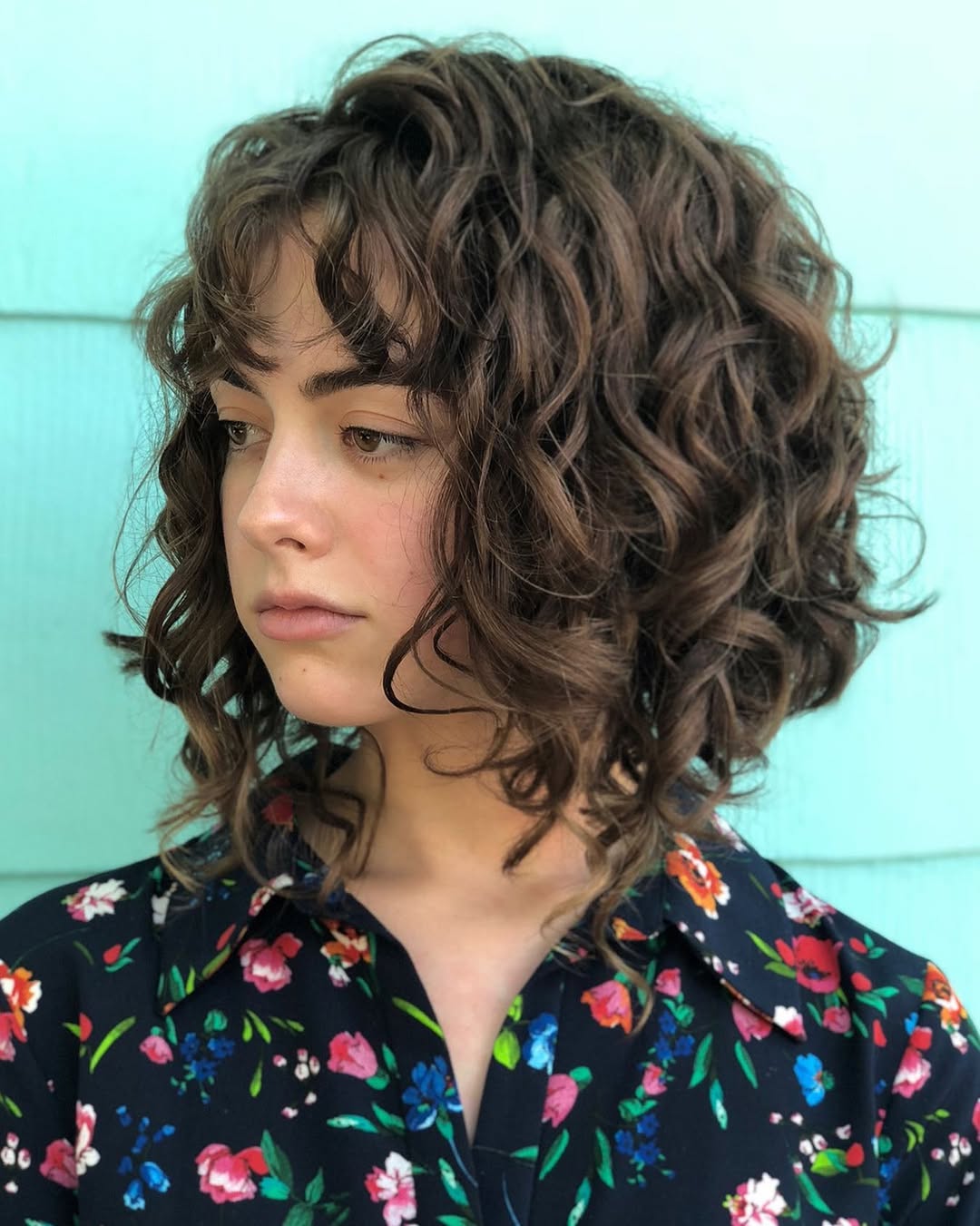 Curly Textured Bob With Wispy Bangs