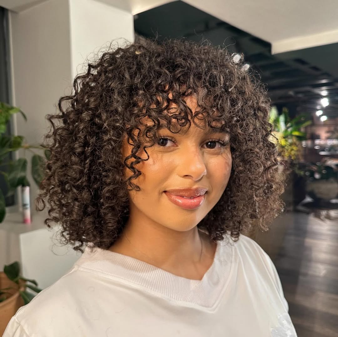 Curly Textured Bob With Wispy Bangs