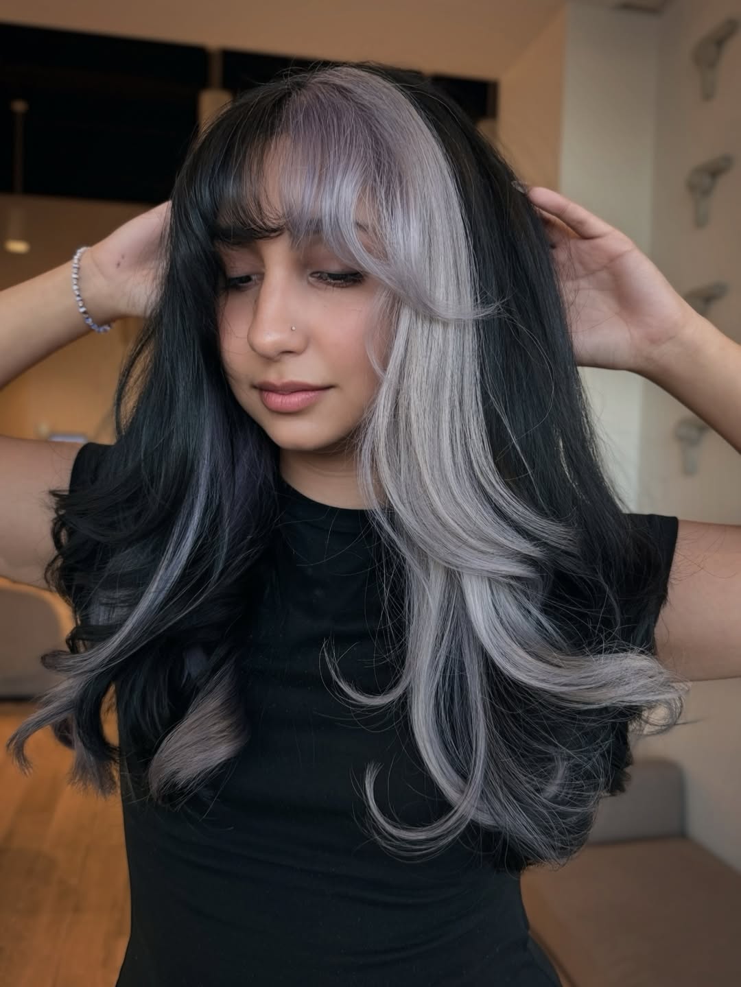 Daring Silver Streak Face-Framing With Black Hair
