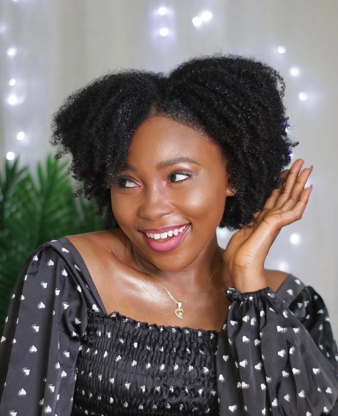 Defined Coily Bob With Side Part