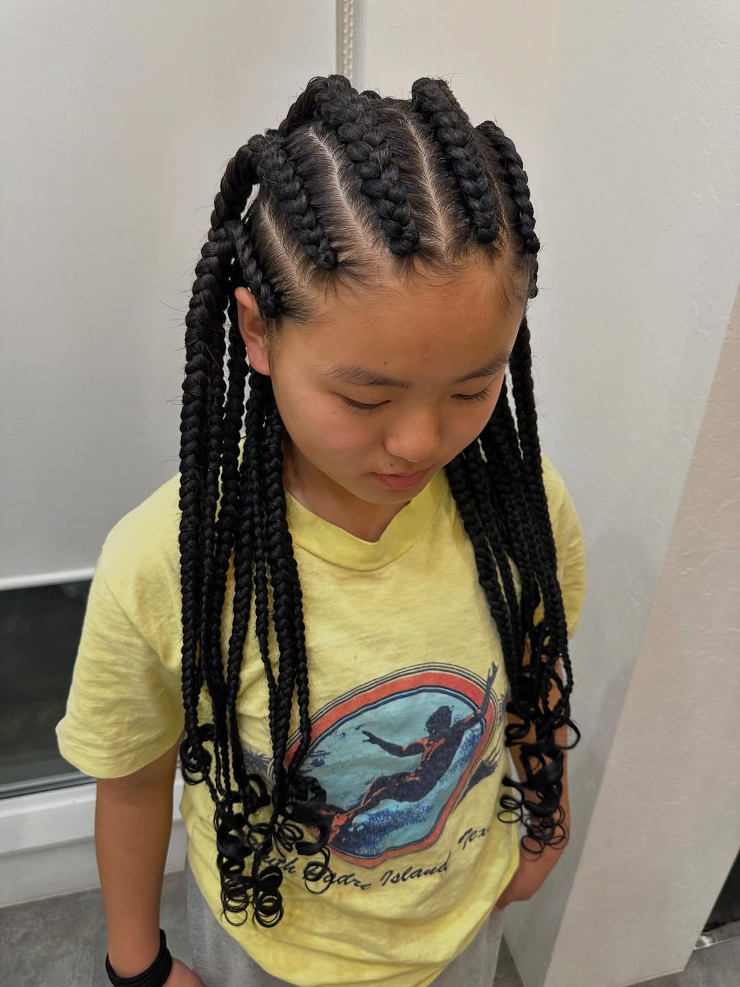 Defined Cornrows With Curly Faux Locs