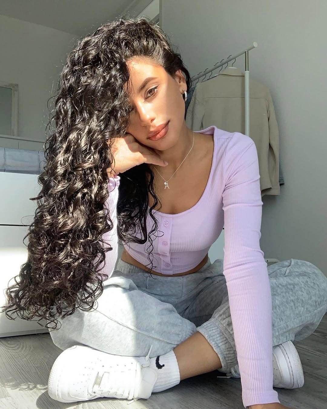 Defined Long Curly Hair With Side Part