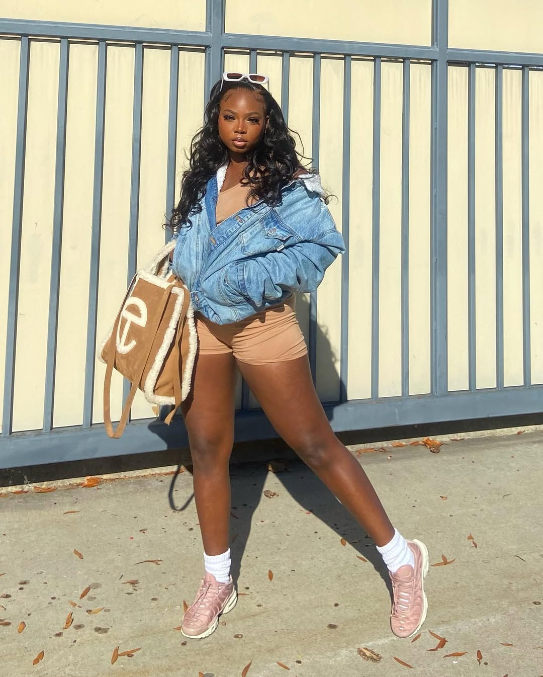 Denim Jacket With Bike Shorts And Sneakers