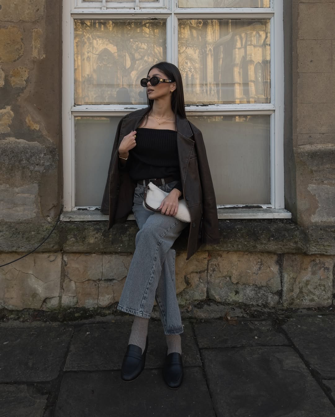 Distressed Leather Blazer With Off-Shoulder Top And Jeans
