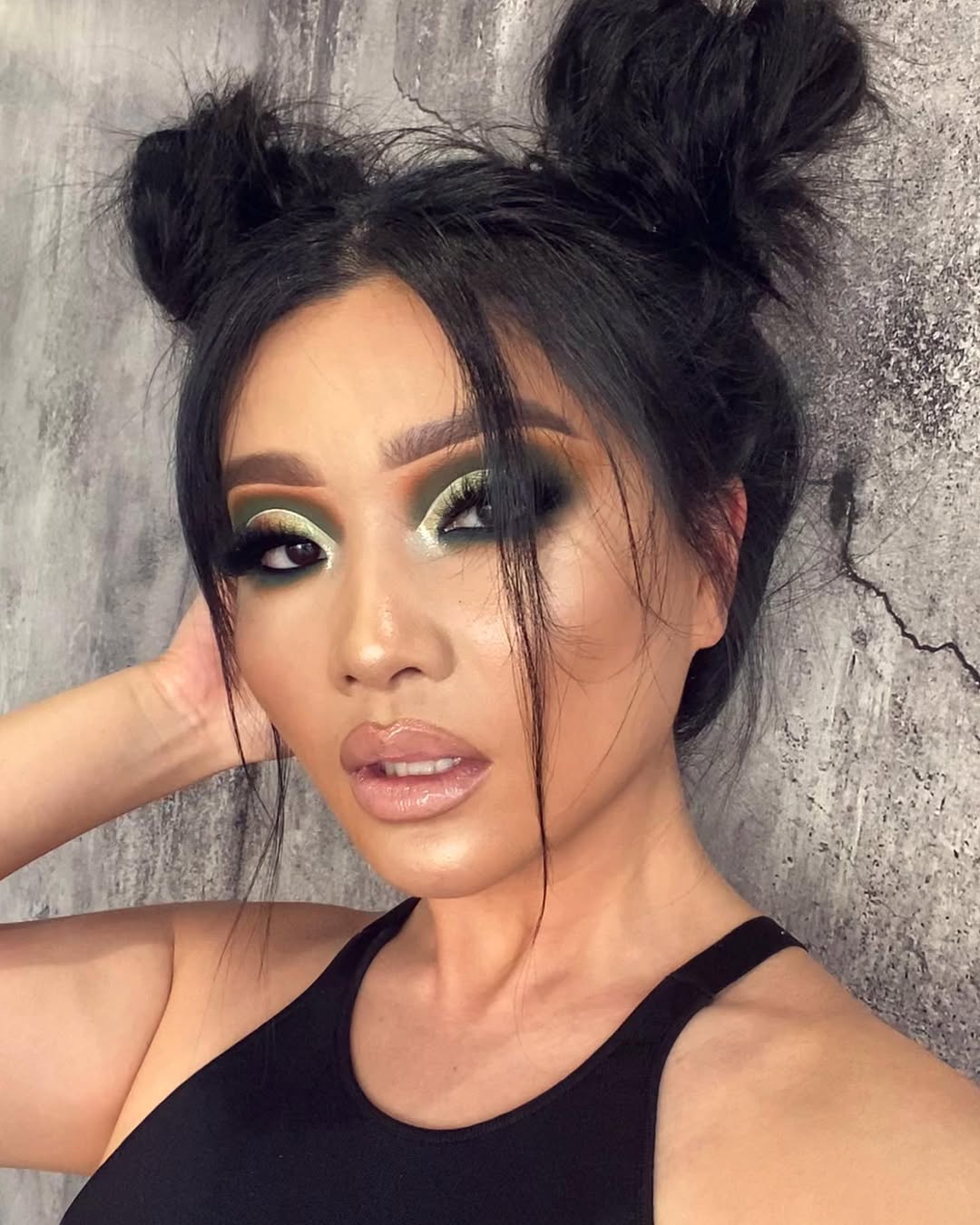 Double Space Buns With Face-Framing Strands