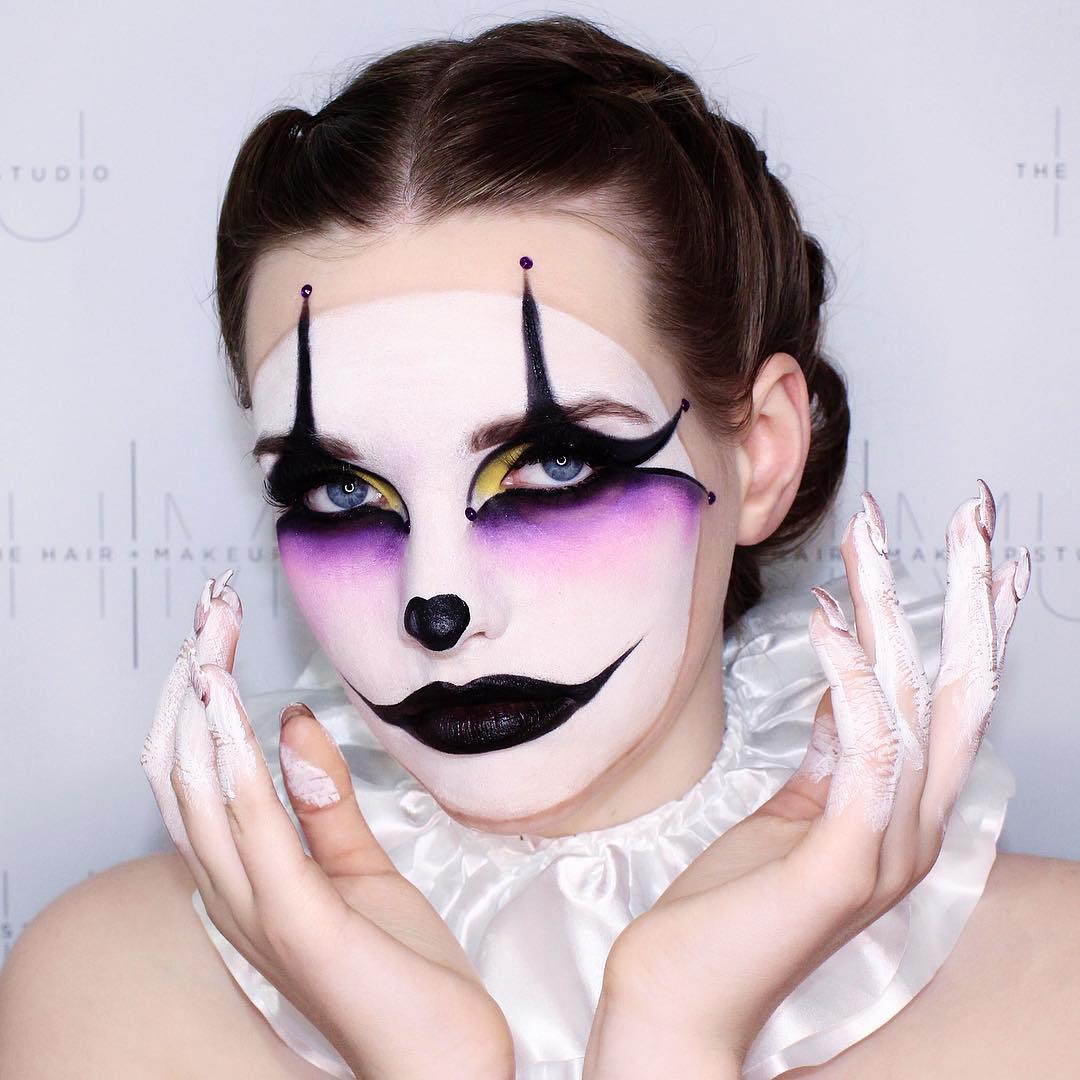 Dramatic Clown Updo With Face-Framing Braids