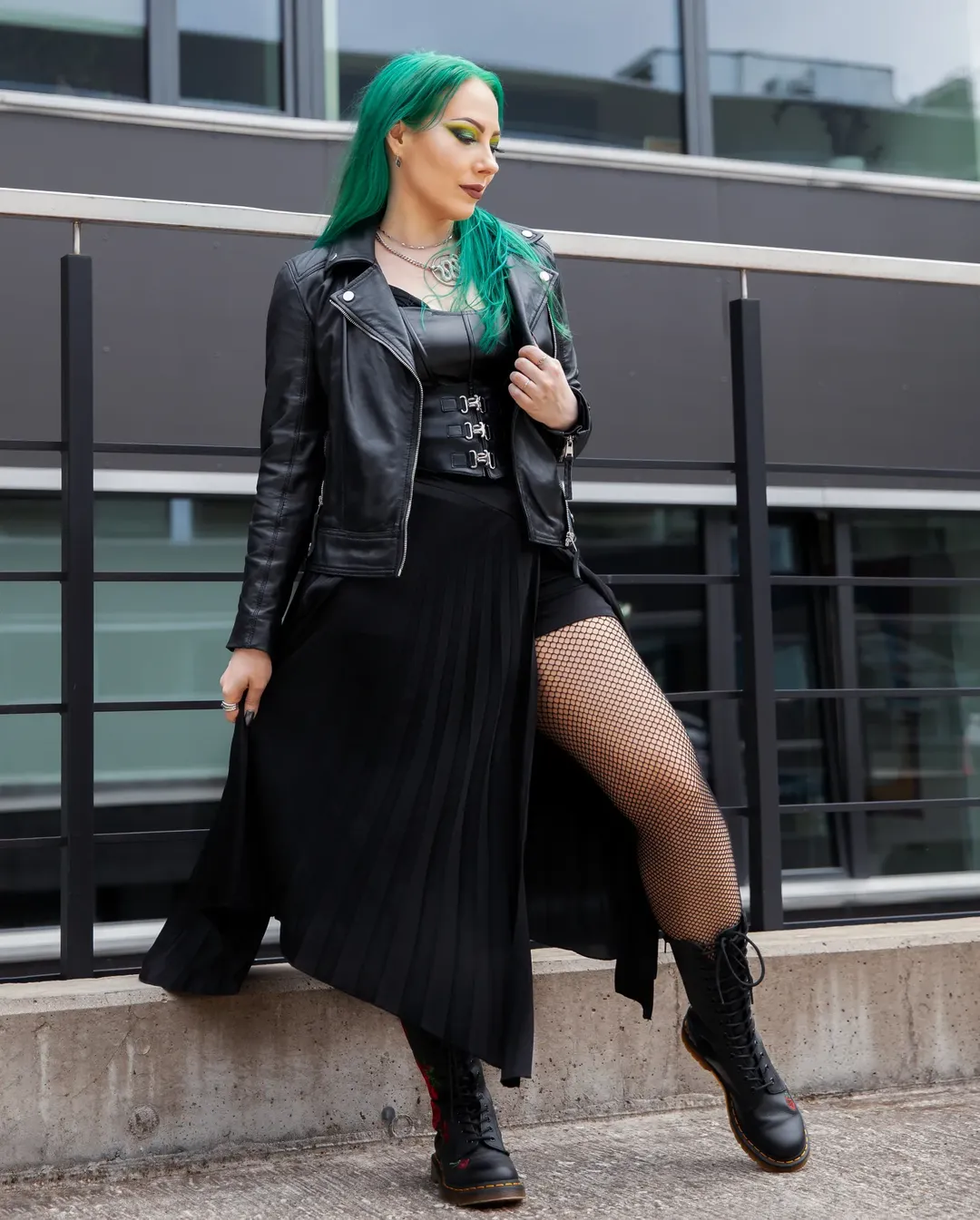 Edgy Black Leather Biker Jacket With Pleated Skirt