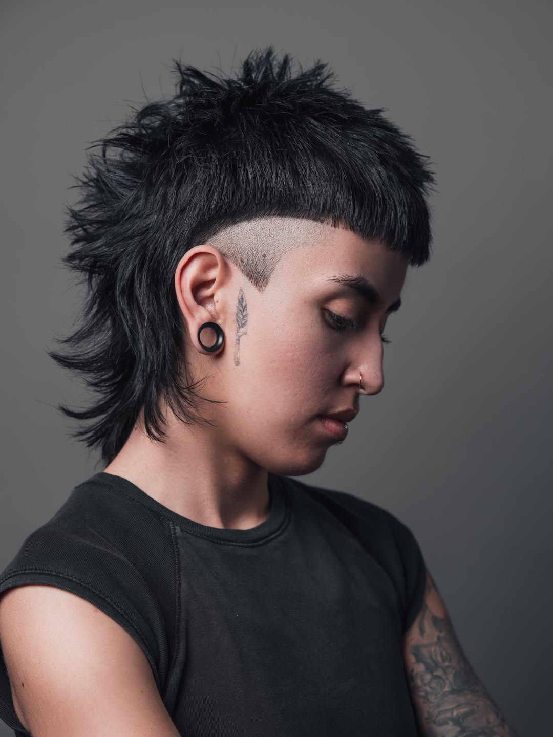 Edgy Jet Black Mullet With Skin Fade
