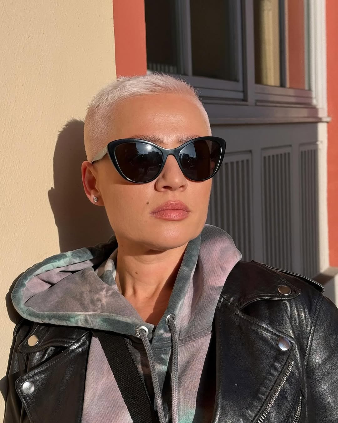 Edgy Platinum Pixie With Buzzcut Sides