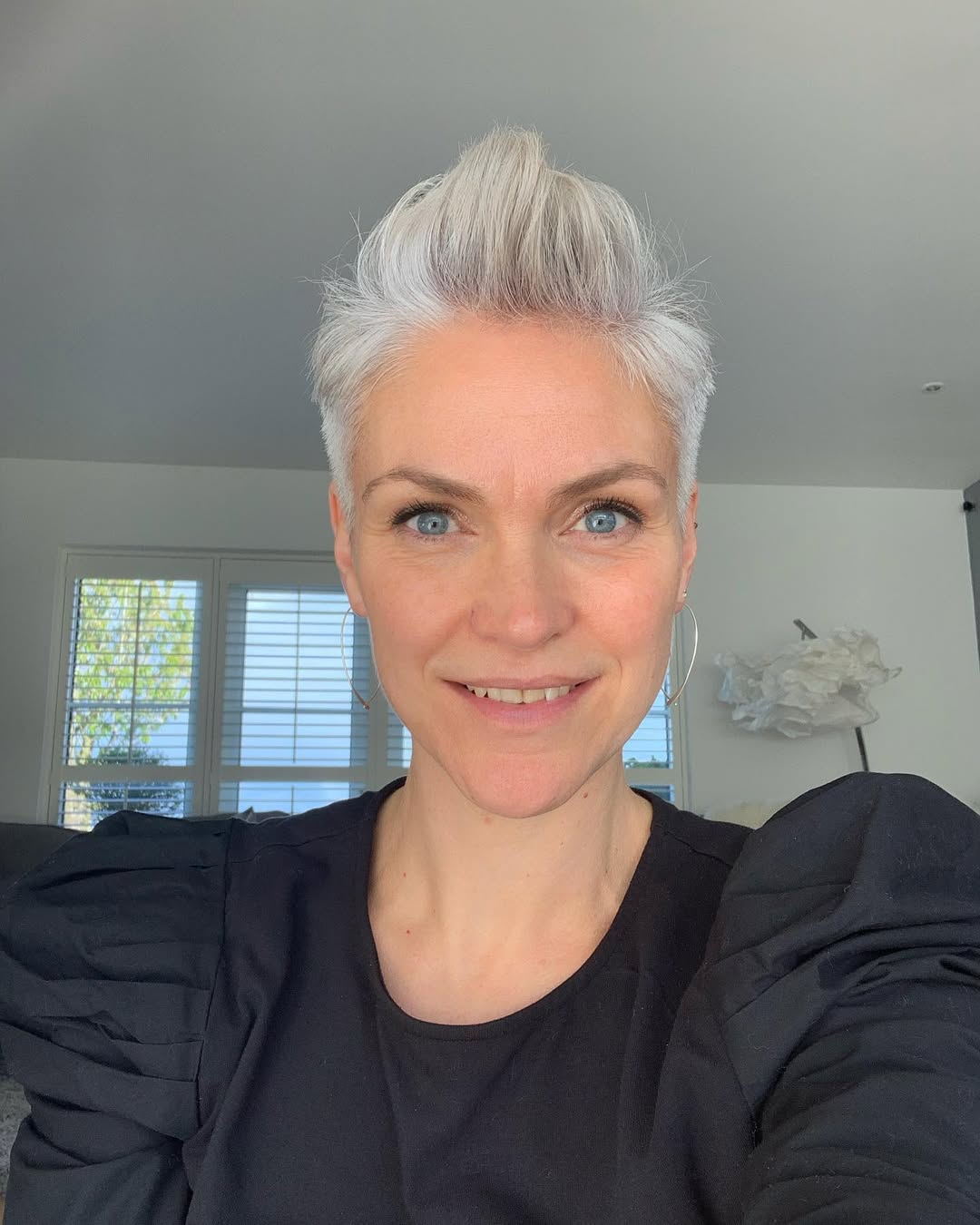 Edgy Spiky Gray Platinum Pixie Cut