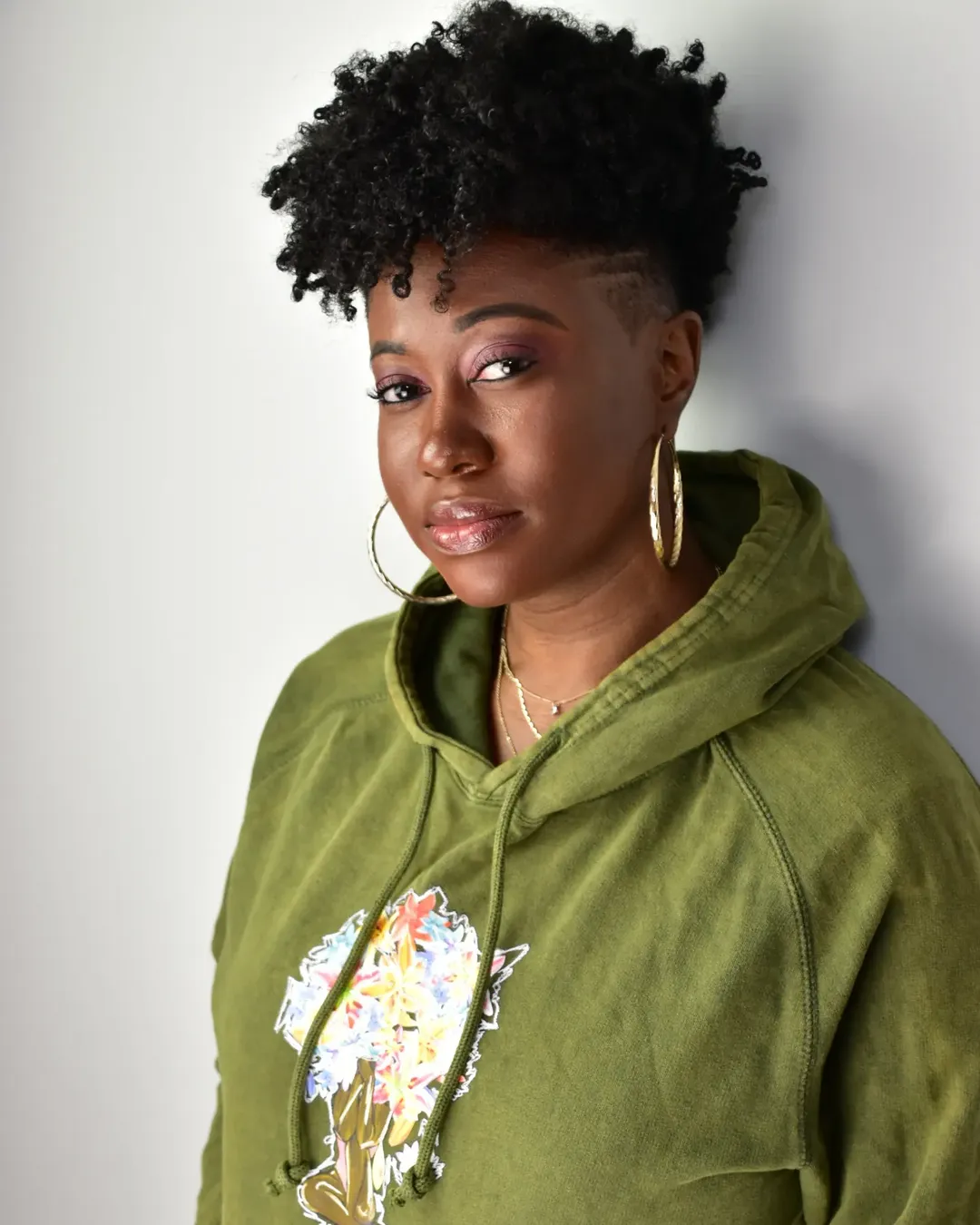 Edgy Tapered Pixie Afro With Shaved Sides