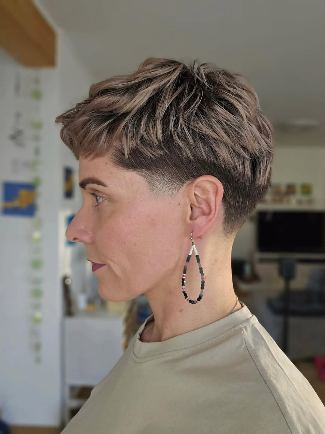 Edgy Textured Pixie With Subtle Highlights