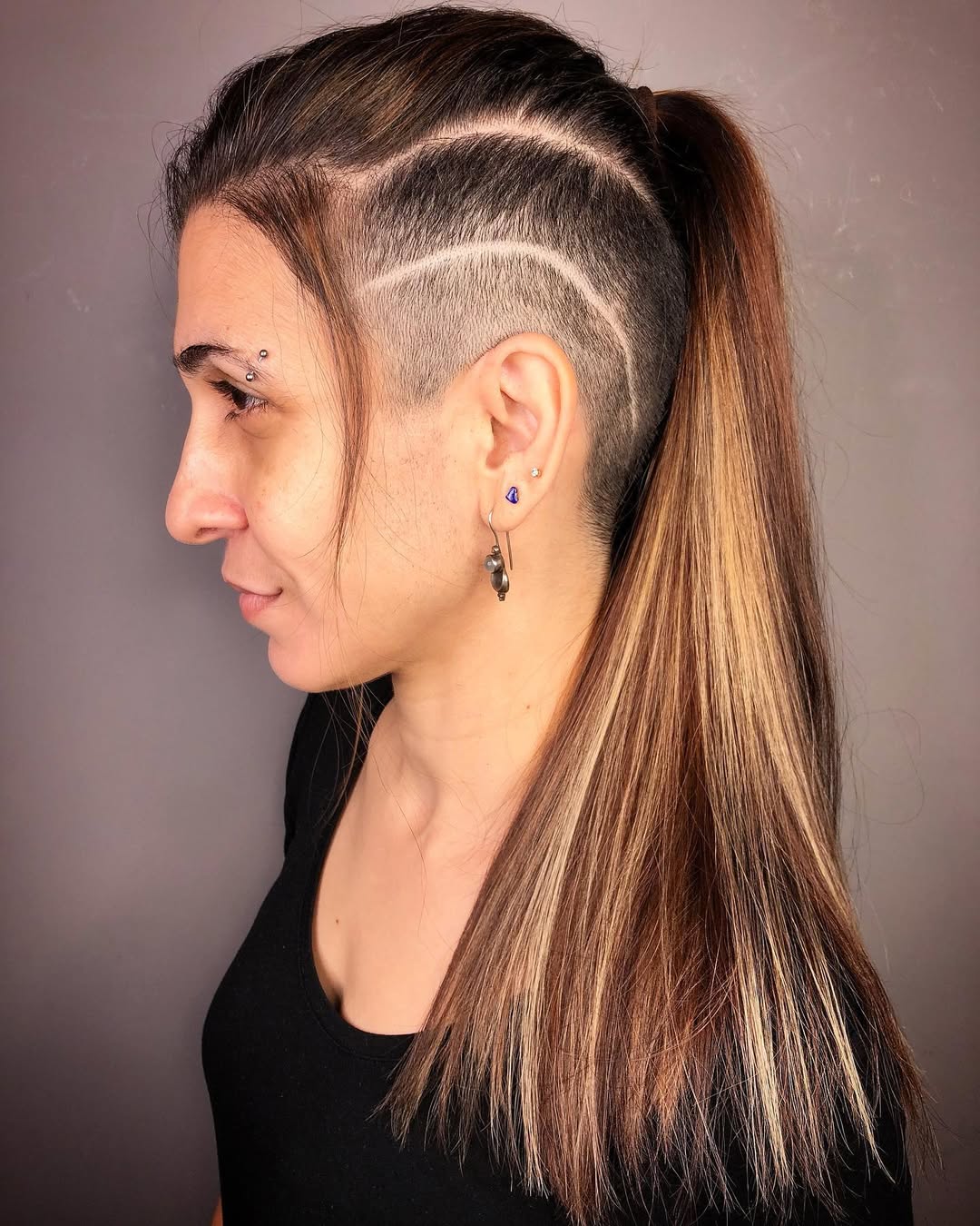 Edgy Undercut With Caramel Balayage Ponytail