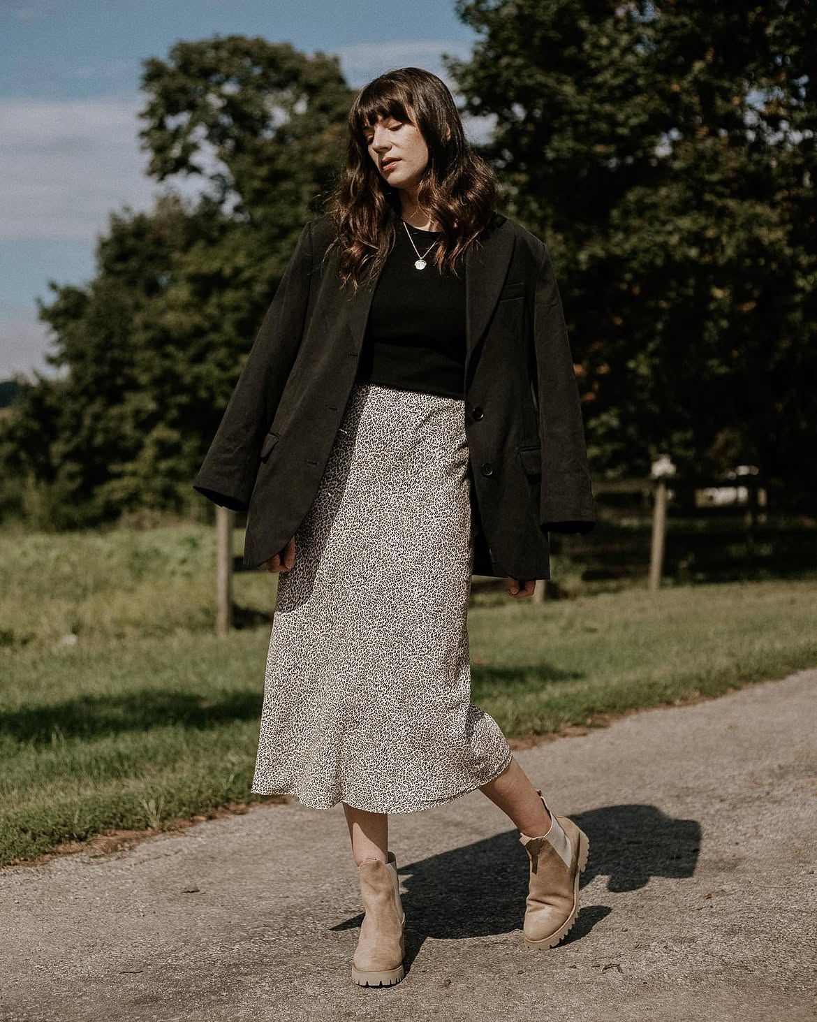 Effortless Chic: Floral Midi Skirt With Chunky Boots