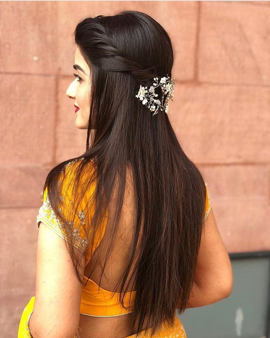 Elegant Half-Up Braid With Ornate Hair Clip