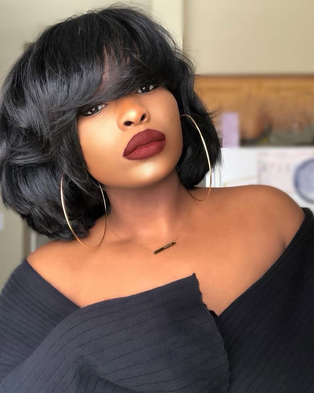 Glamorous Black Bob With Feathered Bangs