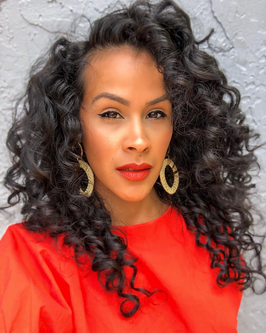 Glamorous Defined Curls With Side Part