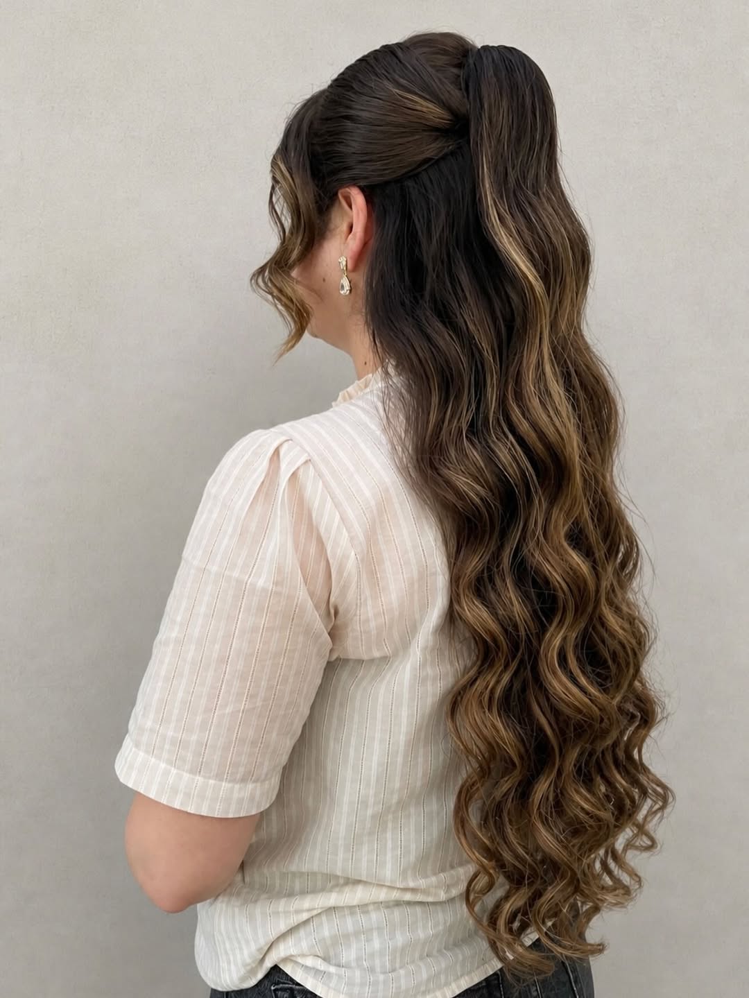 Glamorous Half-Up Ponytail With Golden Balayage Waves