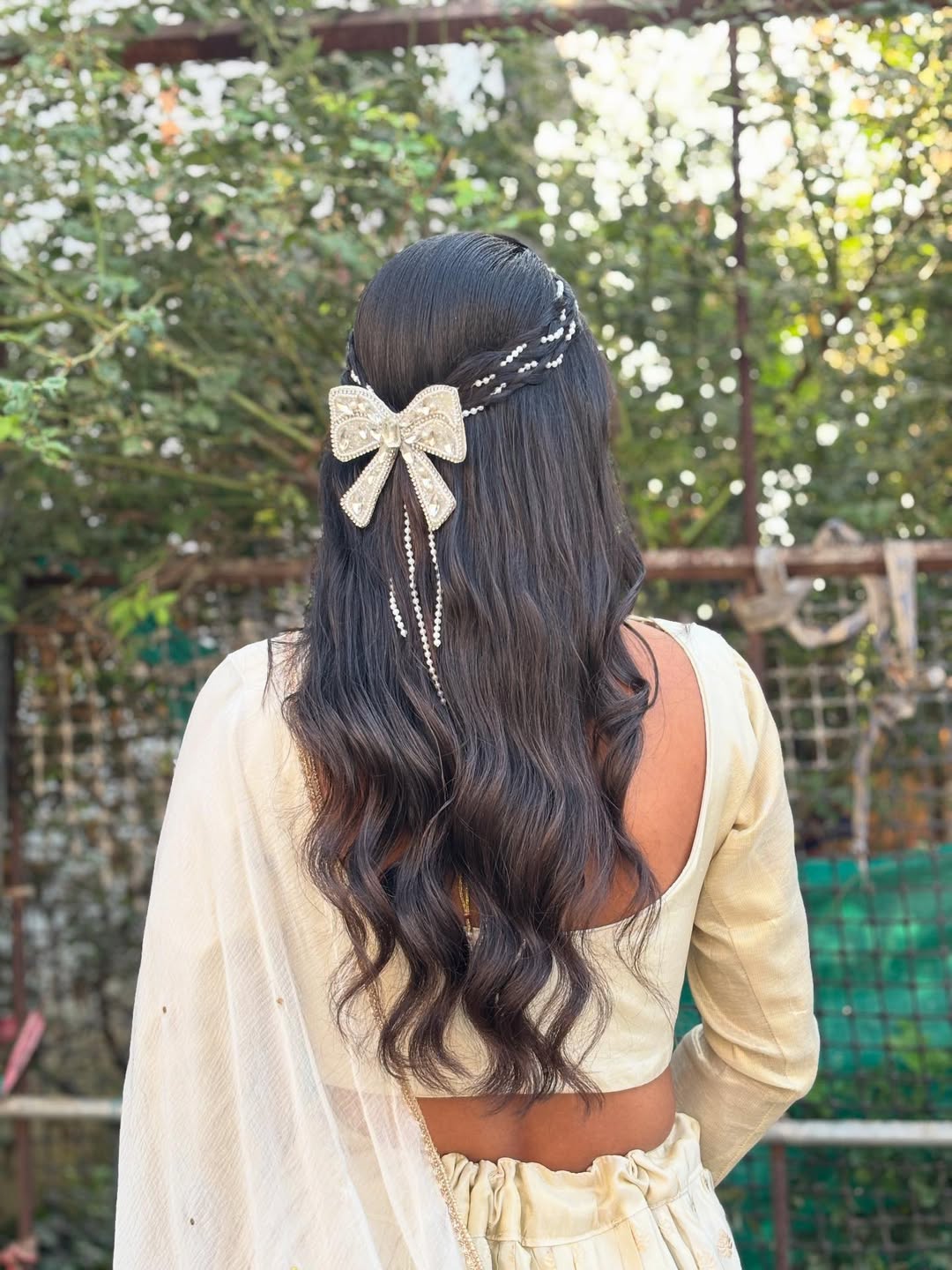 Glamorous Half Up Waves With Sparkle Bow
