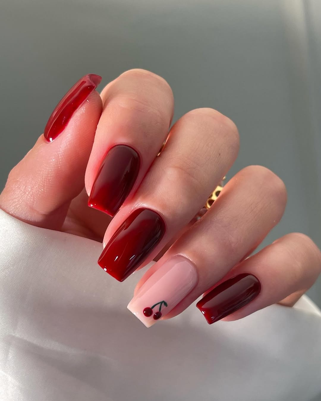 Glossy Deep Wine Red Short Square Nails with Cherry Accent