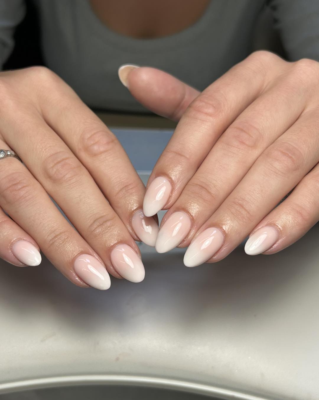 Glossy Pink to White Ombre Almond Nails