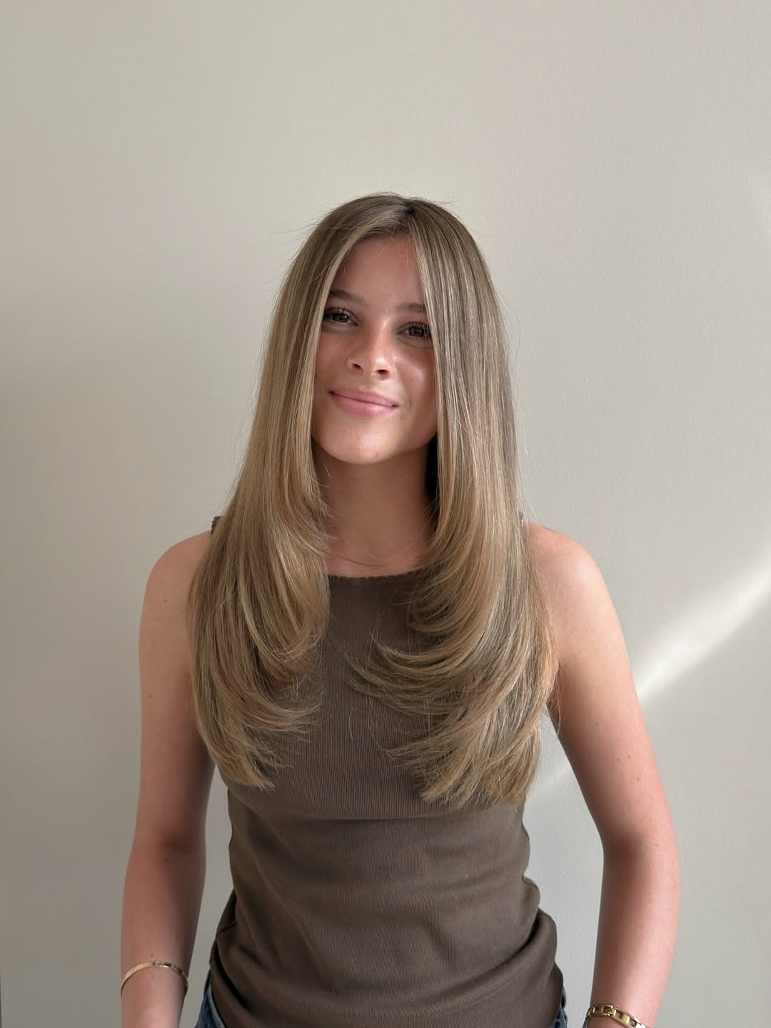Golden Blonde Layers Blowout With Face-Framing