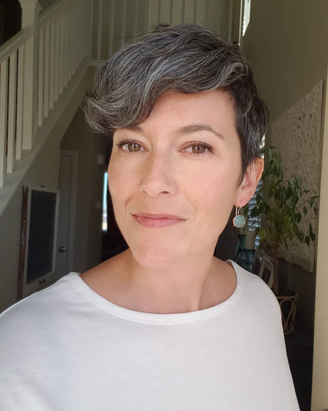 Gorgeous Gray Pixie With Voluminous Side Bangs