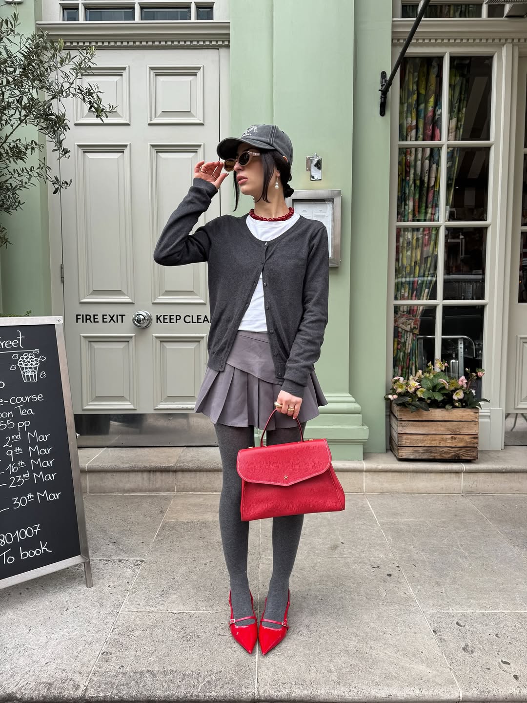 Grey Cardigan Pleated Skirt Look With Red Accents