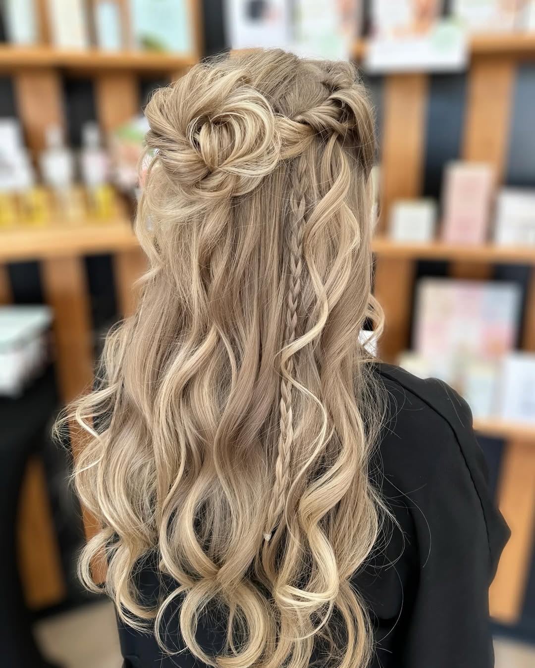 Half-Up Rosette Braids with Loose Blonde Waves