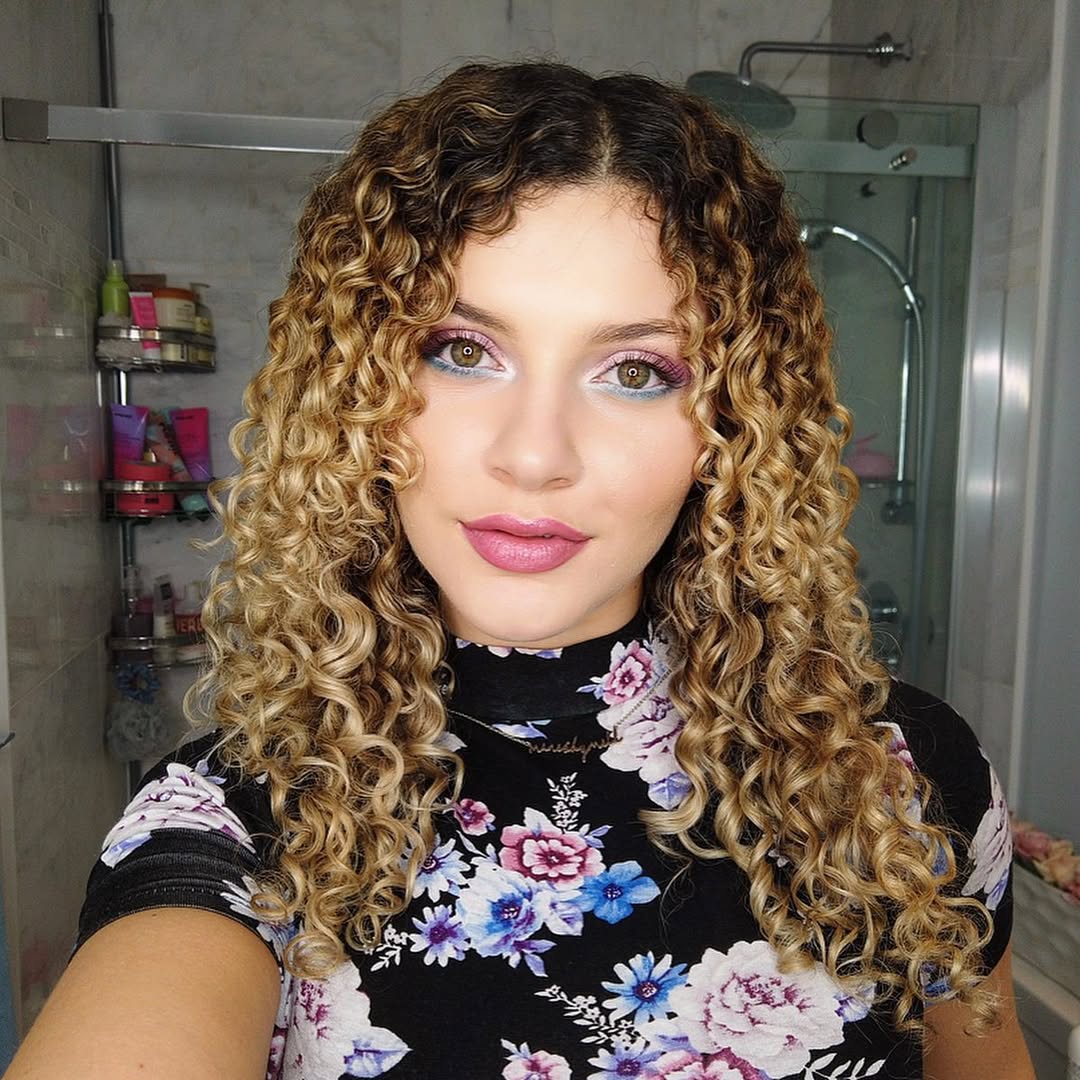Honey Blonde Curly Layers With Defined Coils
