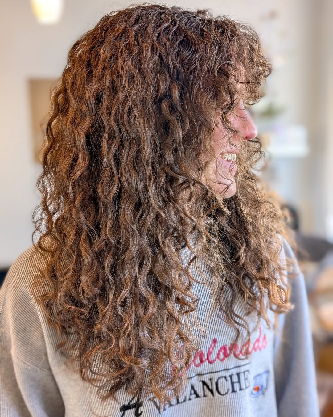 Honey Blonde Long Free-Flowing Curly Layers